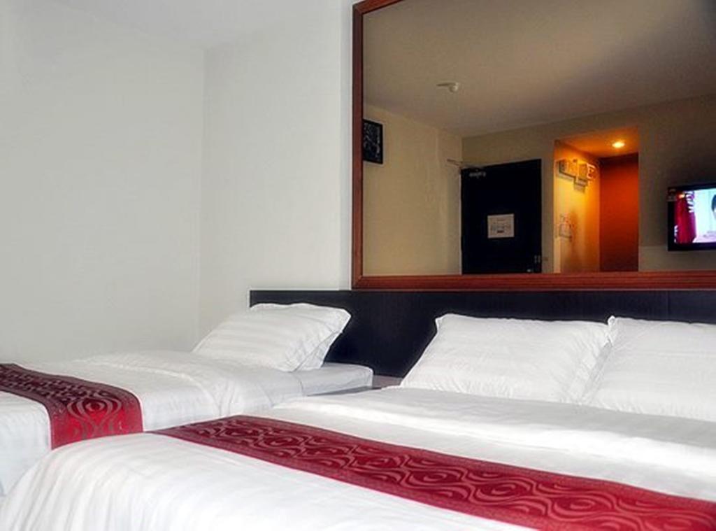 Goldenhill Hotel Kota Kinabalu Pokoj fotografie